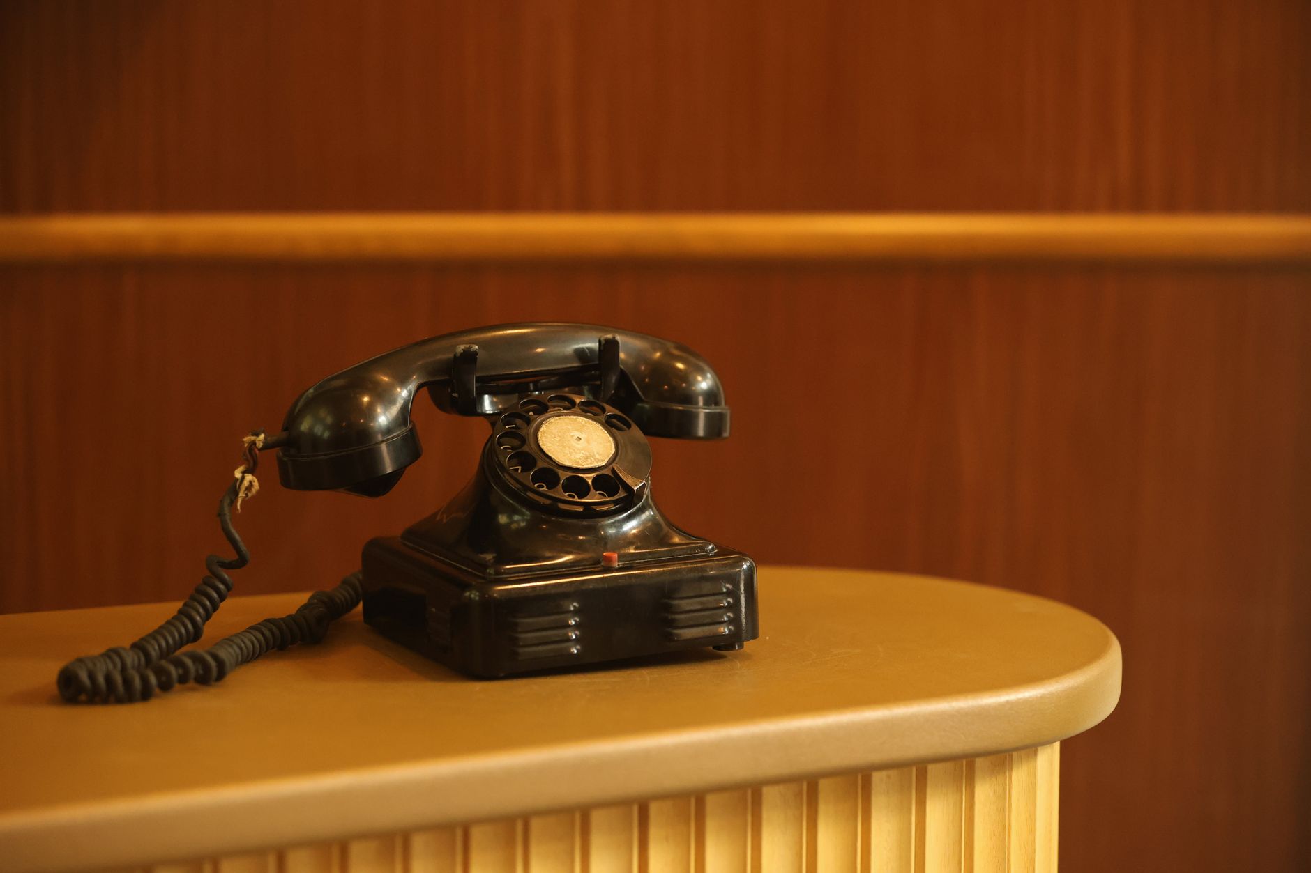 Front desk phone setup at a small insurance agency office
